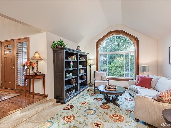Entry & formal living room. Note the ornate wood detail around the window!