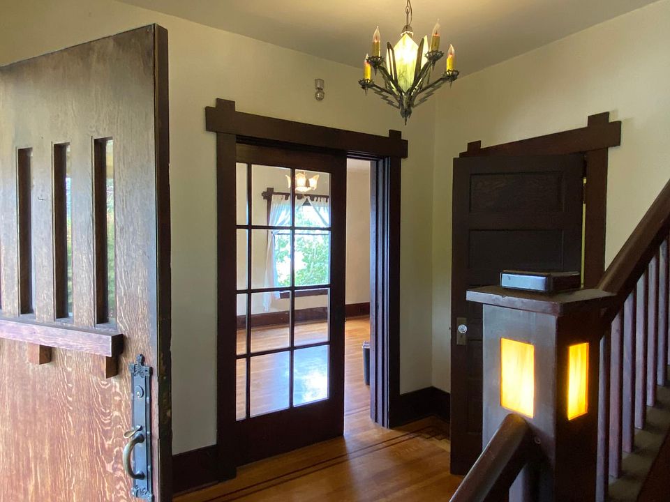 entry foyer with pocket door to living room