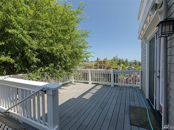 Enter the deck from the dining room to the brick pathways that cover the whole lot.