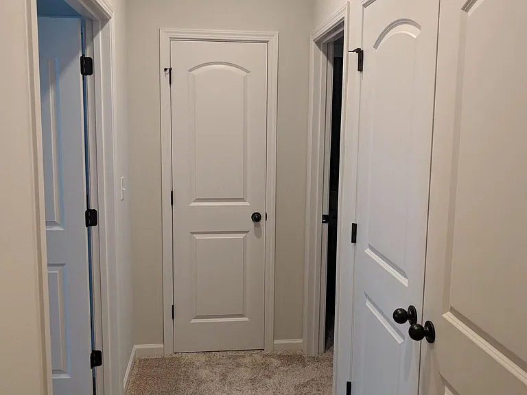 Linens closet and hidden washer/dryer
