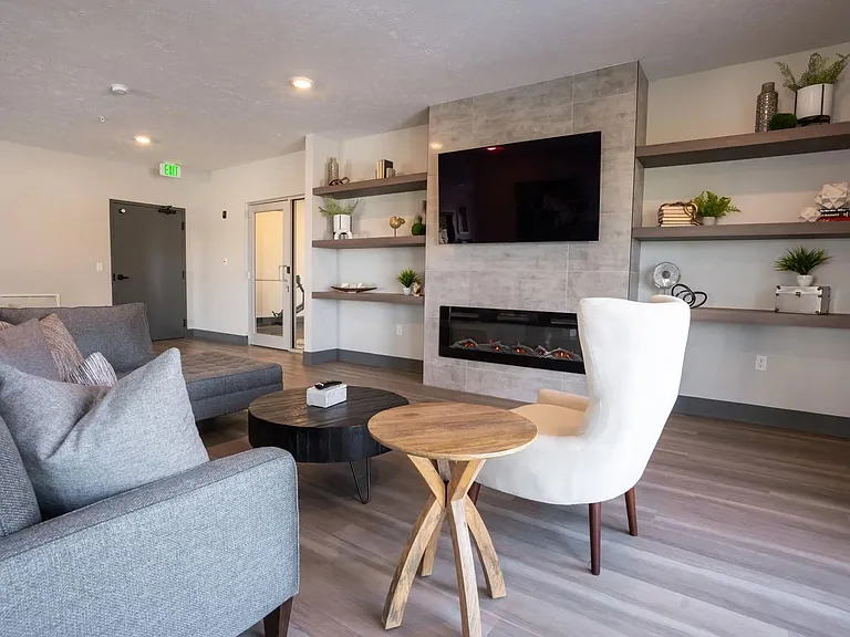 Fireplace and seating in the clubhouse at The Harbor.