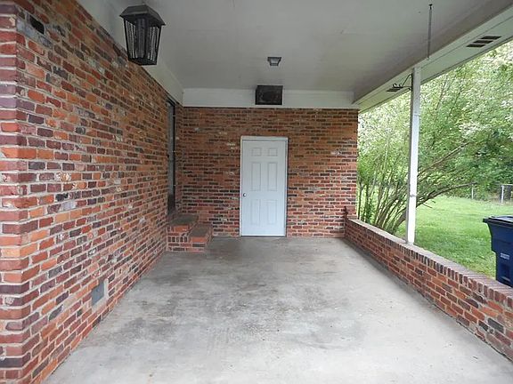 The carport keeps you out of the rain, and also isn't a bad place to grill a steak and drink a beer on a summer night. Ask me how I know!