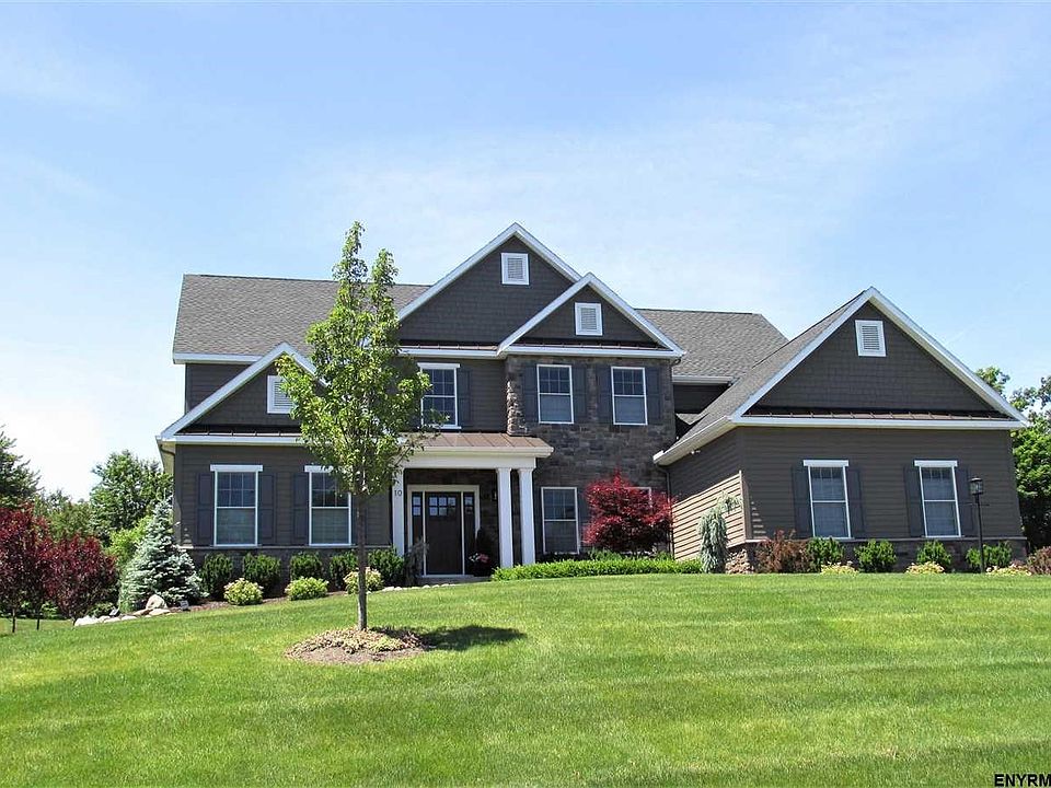 Custom Home in East Hills.   3,546 sq ft, 4 bedrooms, 4.5 baths, 3 car garage, .46 acre lot.