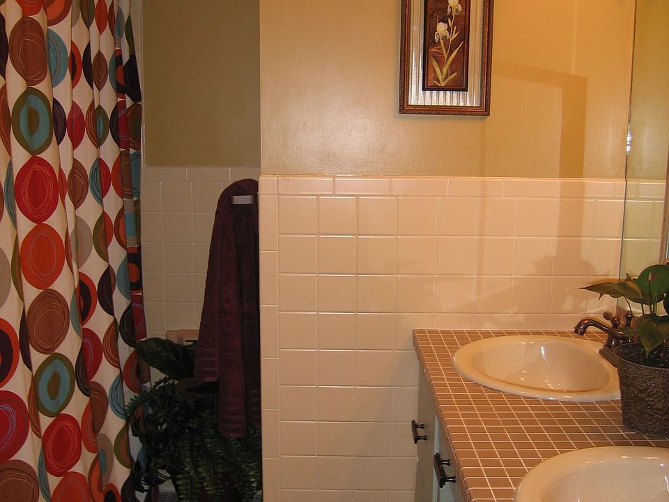 New, stylish sinks and  fixtures,classic tile.