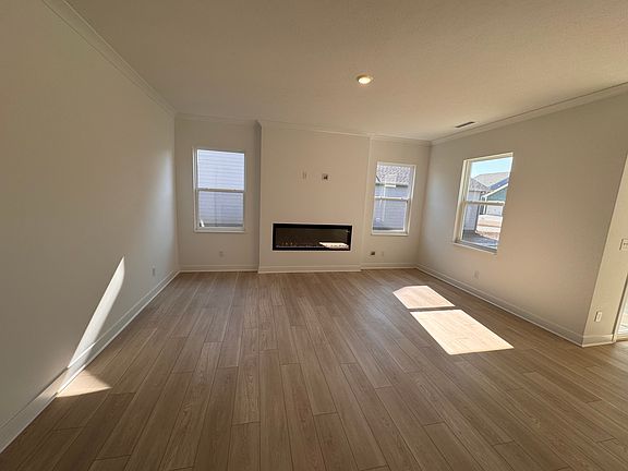 Living room with fireplace and TV hookup