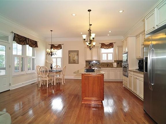 Large kitchen open to great room and breakfast area