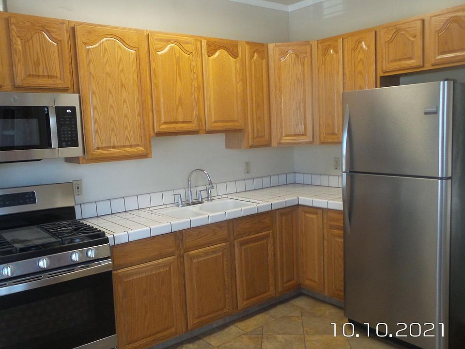 The kitchen is large and it can easily handle a 4 chair table.