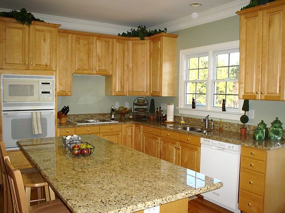 Gourmet Dream Kitchen Features Granite Countertops & an Island