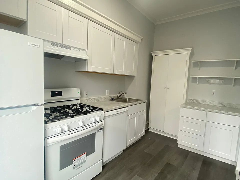 kitchen with new appliances, countertops and cabinets