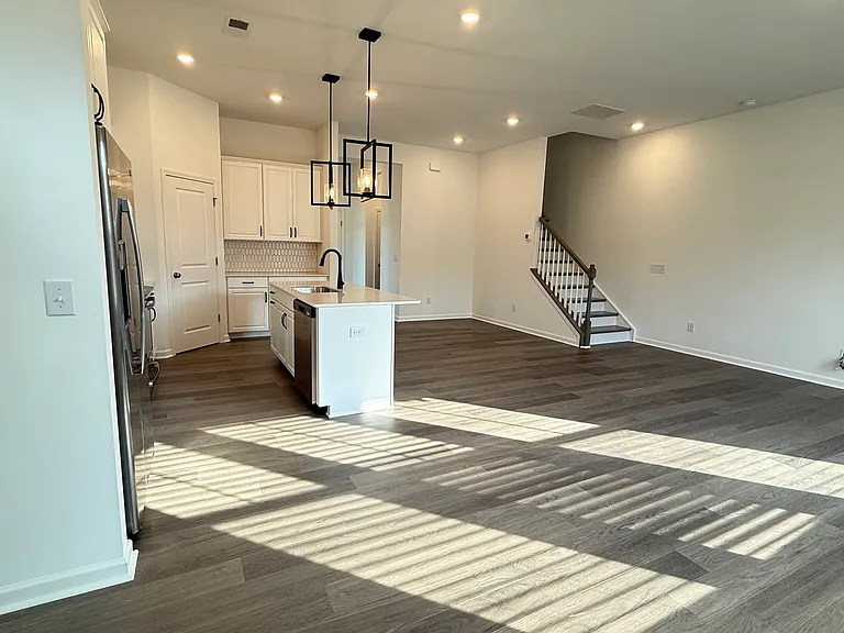 Bright, open-concept living and dining area with abundant natural light.