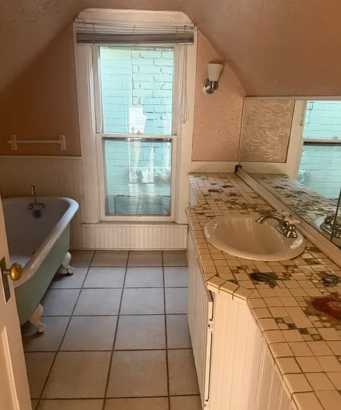 Upstairs Bathroom, full including sink and tub.