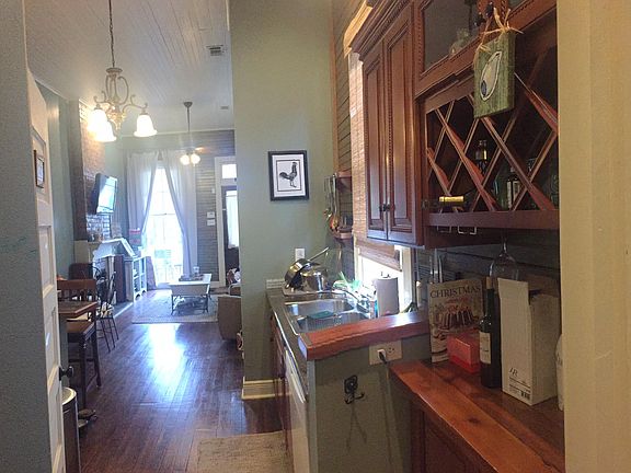 View of Kitchen looking back to Living - Bar Area/Wine Rack