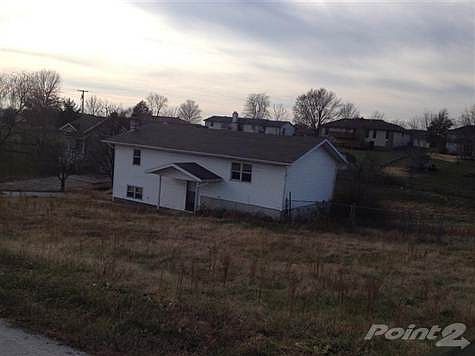 This is a great fixerupper! Lots of potential on small acreage.