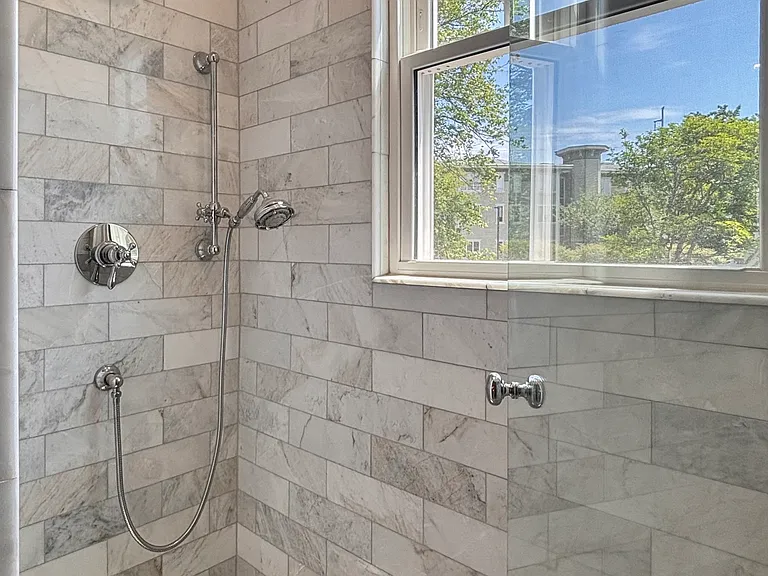 Primary Bathroom Marble Shower with Premium Rohl Fixtures