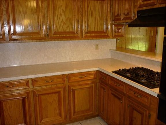 Gas cooktop with vent hood plus gas oven