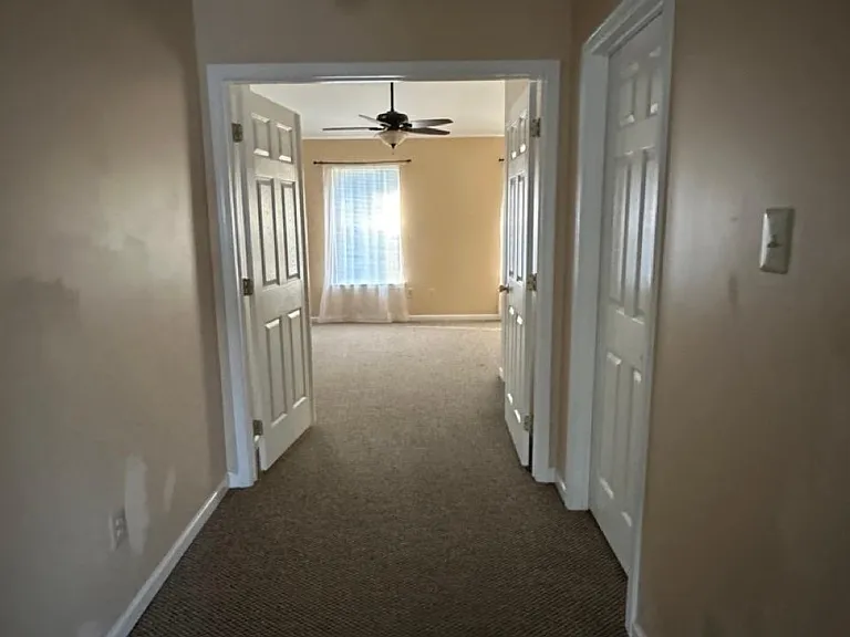 Wide Hallway from Bedrooms to Master Bedroom