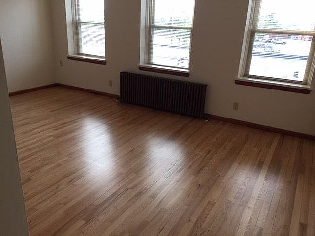 Wood style flooring with many windows