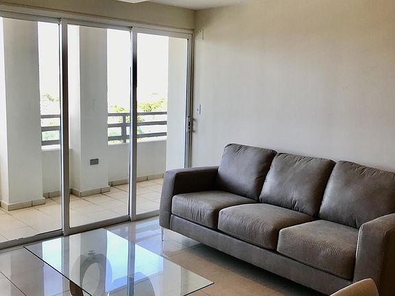 Living Room - Sofa and Coffee Table and Balcony