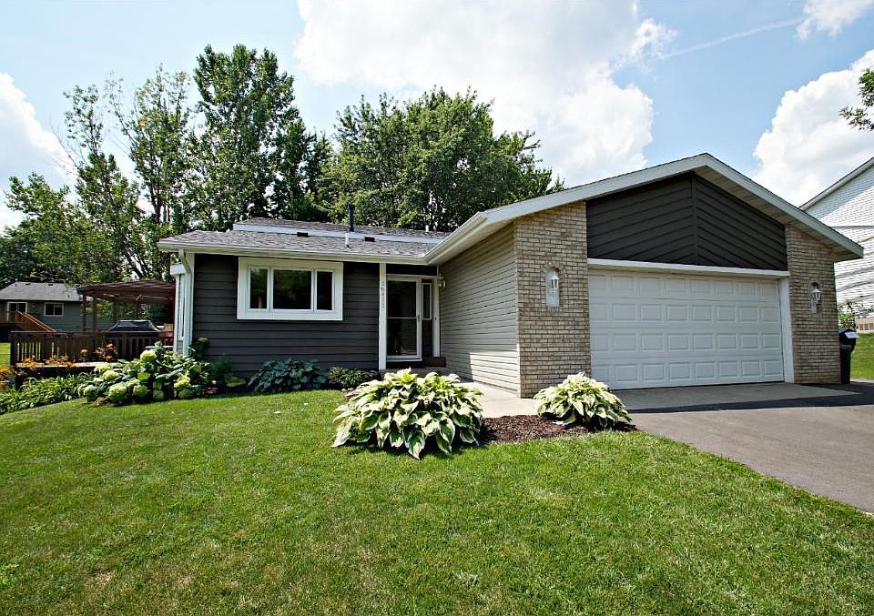 Great home with large front yard, oversized 2 car garage, wide driveway, with 3rd parking space on side of home.