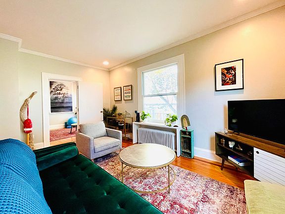 Tasteful mid-century inspired furnishings and local art.