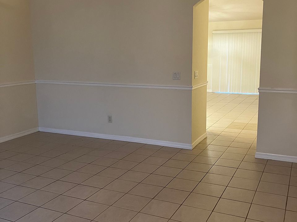 Living room access to kitchen and dining area