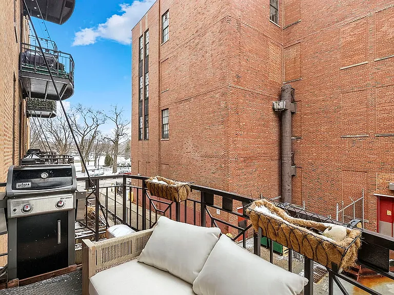 Patio connected to the main living area with views of Skinner Park to the south