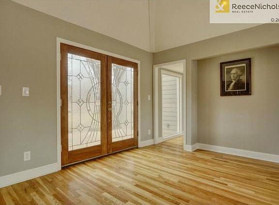 Completely renovated with fresh paint, gleaming hardwood floors,