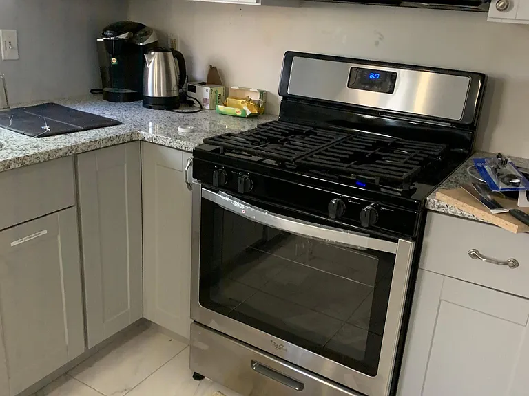 Granite Countertops, Stainless Steel Appliances, Over the stove Microwave