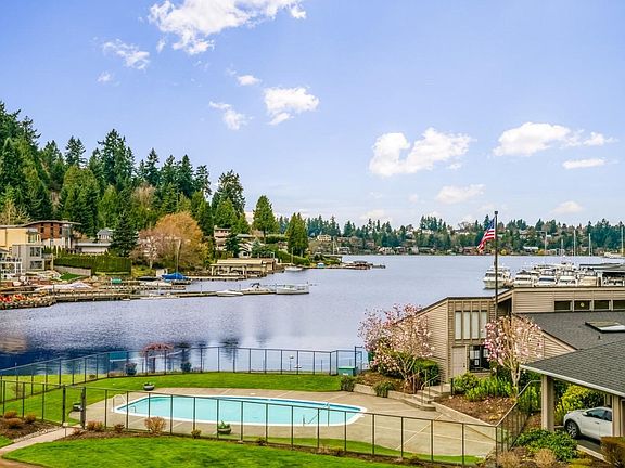 house is on the right, lake side of building. Private entrance on driveway side.