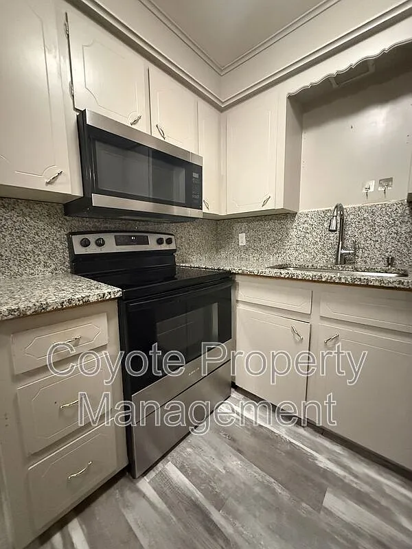 Building Photo - 1737 S Peoria Ave #31