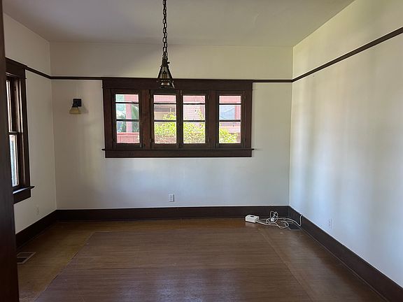 First bedroom / Den with walk in closet