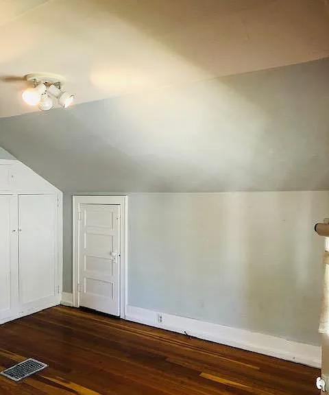 upstairs bedroom. Has new neutral paint and light fixtures that are not shown.