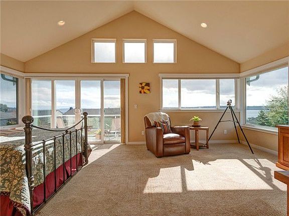 Tons of natural lighting in this Master bedroom