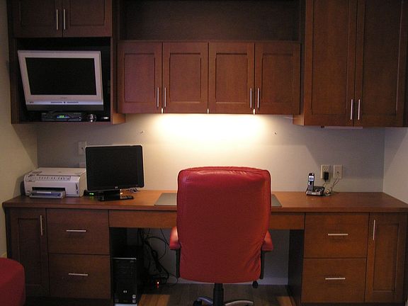 Custom cabinetry in gathering room ideal for home office
