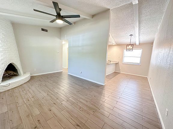 Wood looking porcelain tile throughout entire property