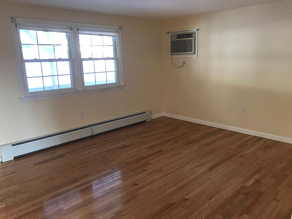 Wood flooring in living room, built-in air-conditioning