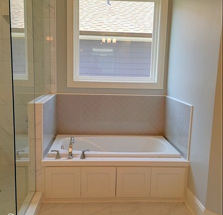 Beautiful Soaking Tub in Master Bathroom