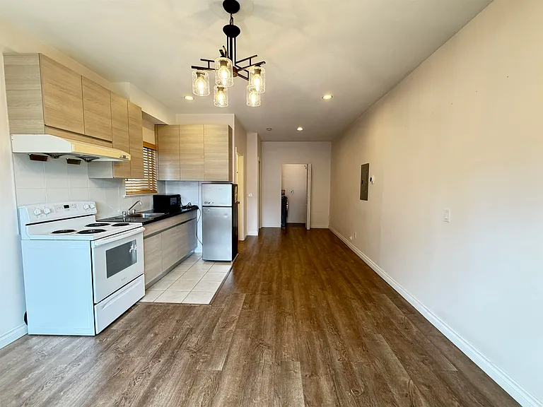 6952 Curtis St — Photo 13