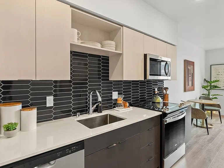 Efficiency meets style: Our modern kitchens are equipped with abundant cabinets for all your storage needs, ensuring a clutter-free and organized culinary space. ____