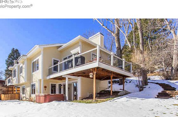 rear elevation with outdoor dining deck