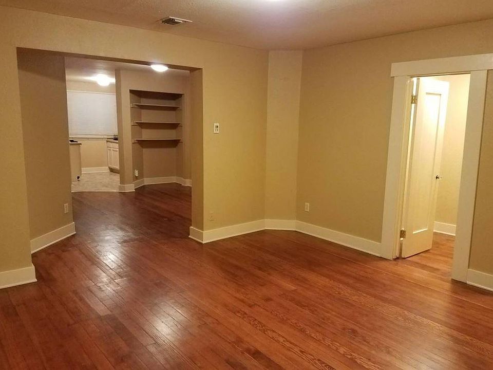 Living Room and Dining Room from front porch to kitchen orie