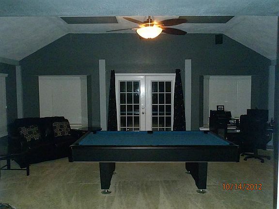 French doors open onto the covered patio.