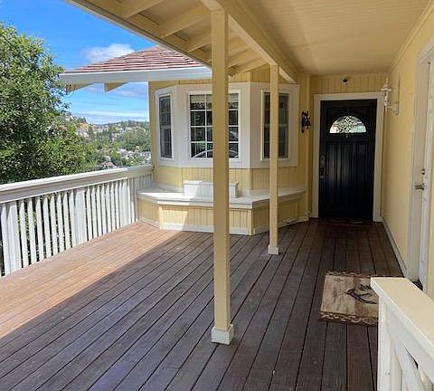 Enjoy the large deck and entrance to the first story of the home with a convenient door to the 2 car garage. Another separate side entrance to the downstairs of the home has a landing and storage closet.