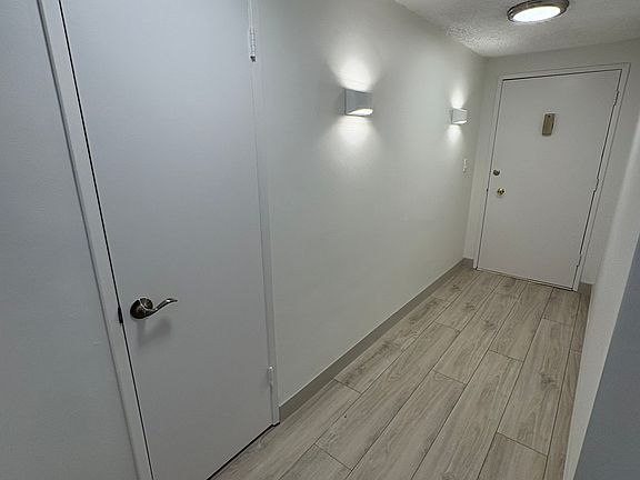 Entry Hallway with Coat Closet