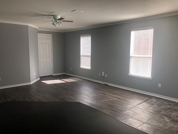 Gorgeous laminate and tile downstairs/ carpet upstairs.