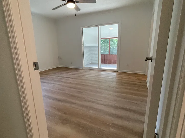 in-law suite with private bath and access to the covered porch.