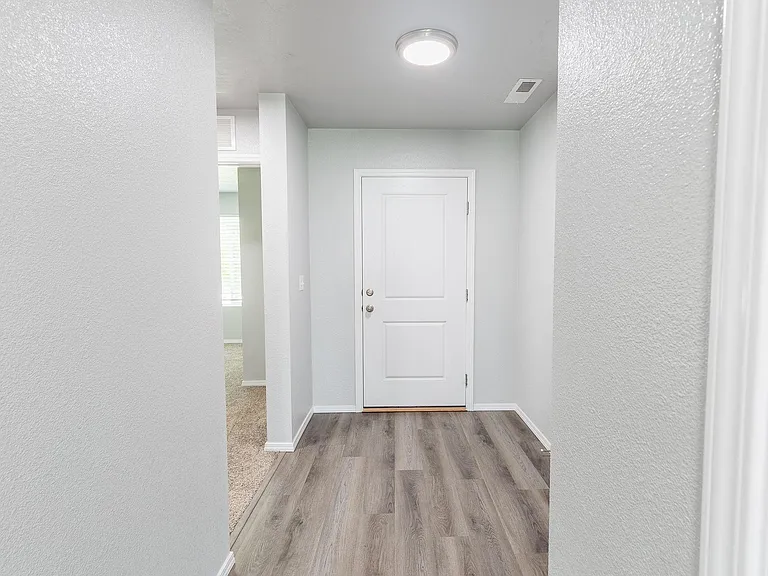 Split bedroom design w/ 2 bedrooms toward the front of the house