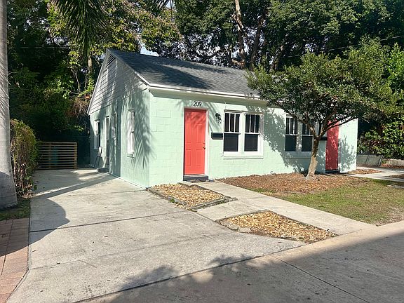 Each side of the duplex includes a private driveway