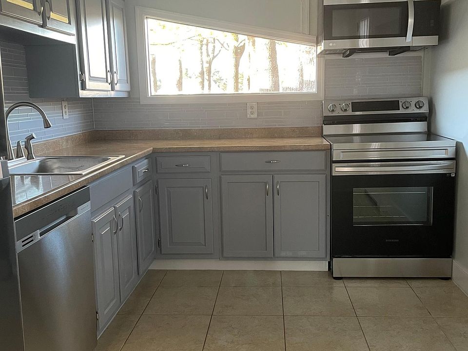 kitchen with new appliances plenty of natural light