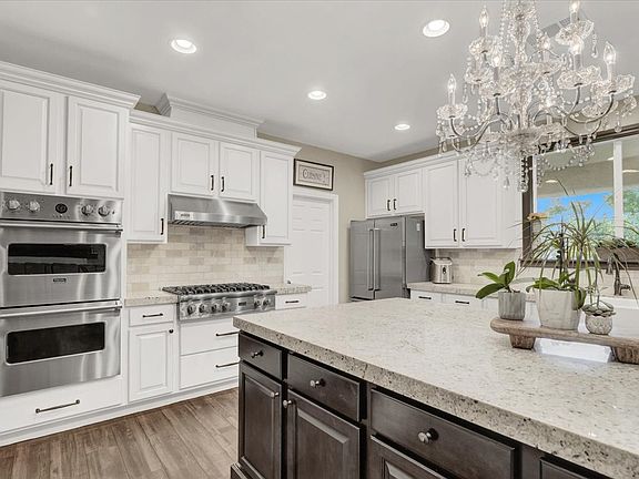 5th image of 12057 La Palmera Ave